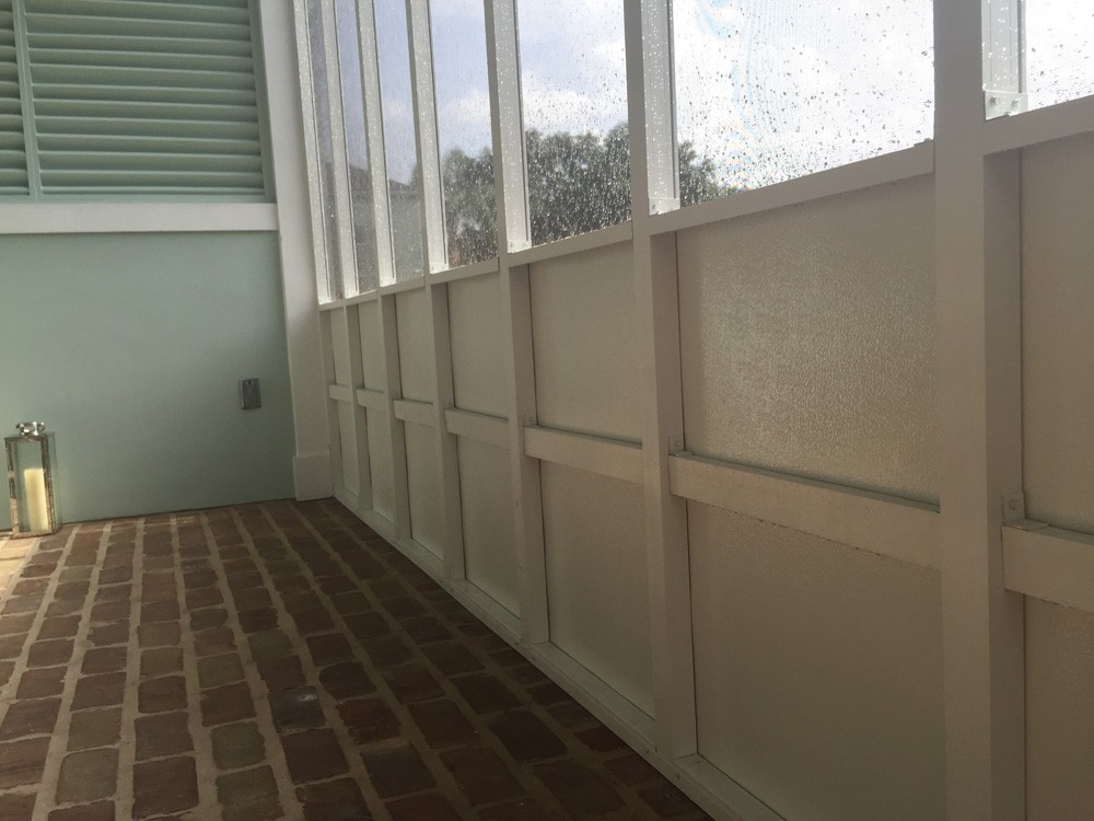 Patio enclosure inside New Orleans home - Strong Shield