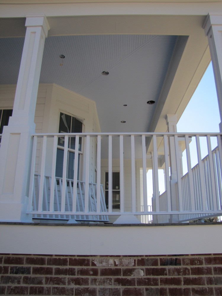 Wrap around porch with blue bead board ceiling - Strong Shield