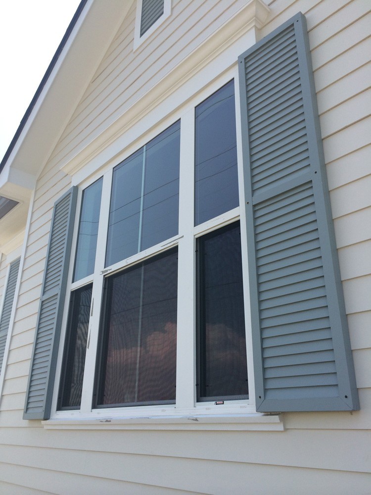 Green shutters on New Orleans home - Strong Shield