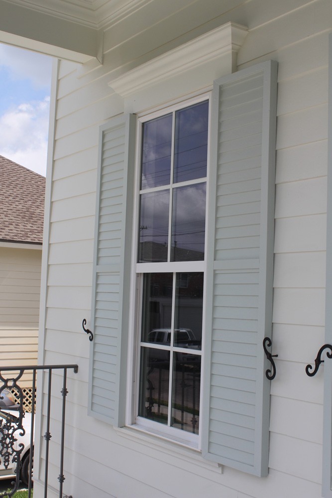 Traditional looking shutters with holdbacks in New Orleans - Strong Shield