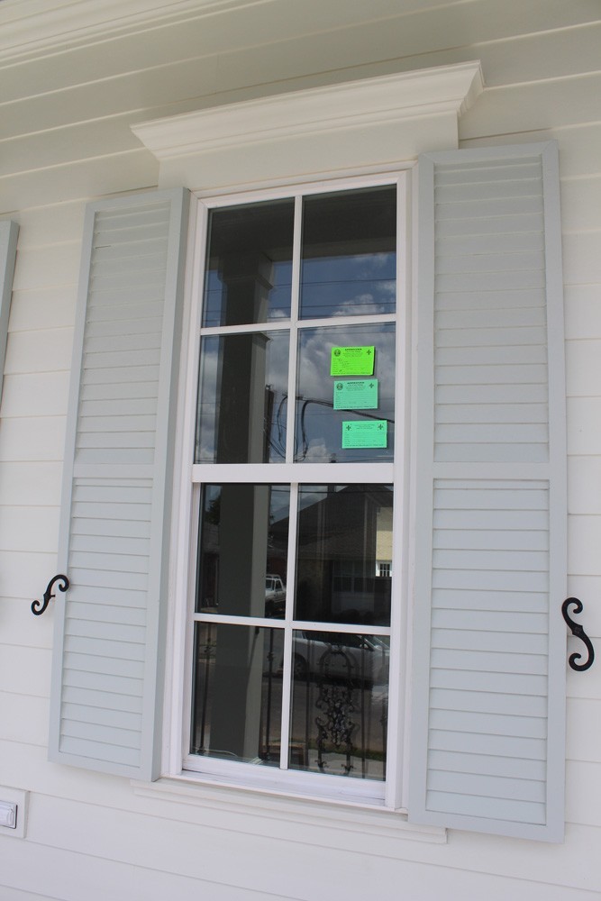 Shutter installation on New Orleans home - Strong Shield