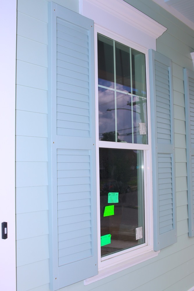 Blue shutters on New Orleans home - Strong Shield