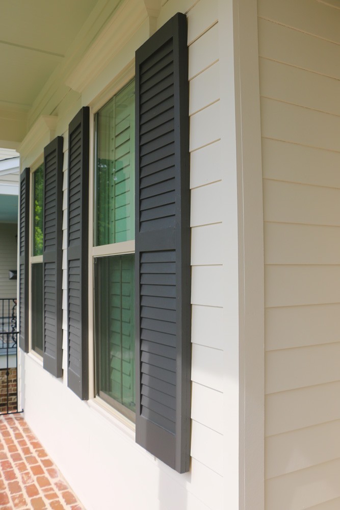 Louver style shutters on New Orleans home - Strong Shield