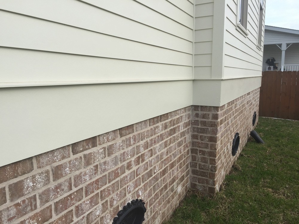 Trim between hardie siding and brick foundation - Strong Shield