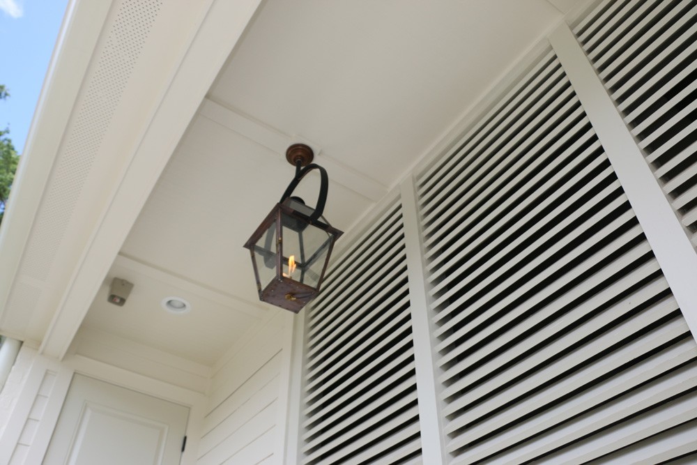 Louvered panels on front porch - Strong Shield