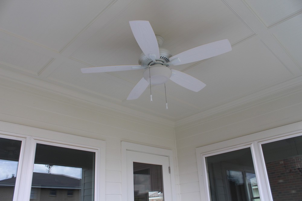 Custom trimmed porch ceiling with fan - Strong Shield