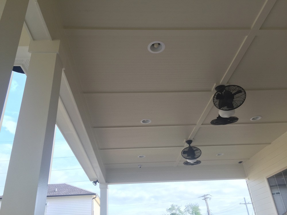 Porch ceiling with bead board, trim, recessed lighting, and fans - Strong Shield