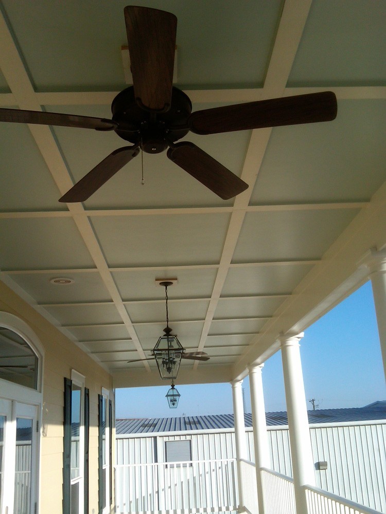 Blue porch ceiling with white trim in New Orleans - Strong Shield