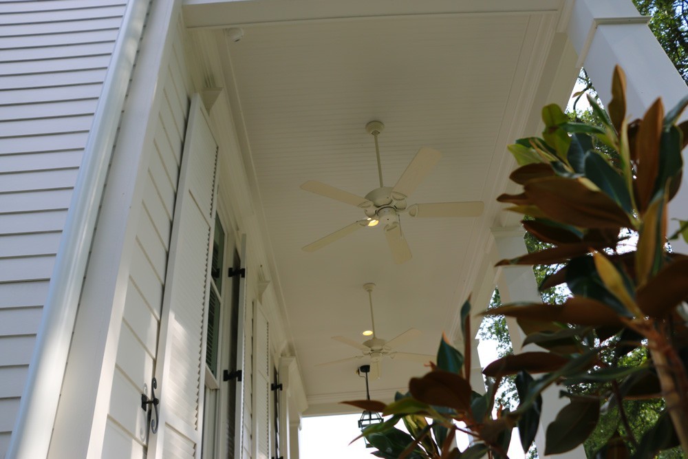 Tall white bead board New Orleans porch - Strong Shield