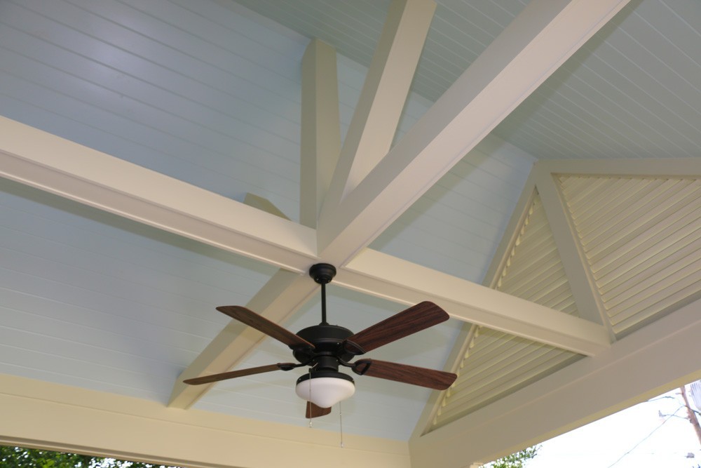 Pitched Metairie porch ceiling with wooden beams - Strong Shield