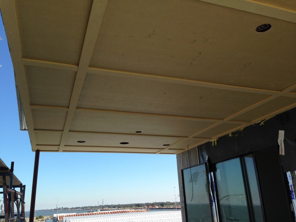 Waterfront porch ceiling with can lights - Strong Shield