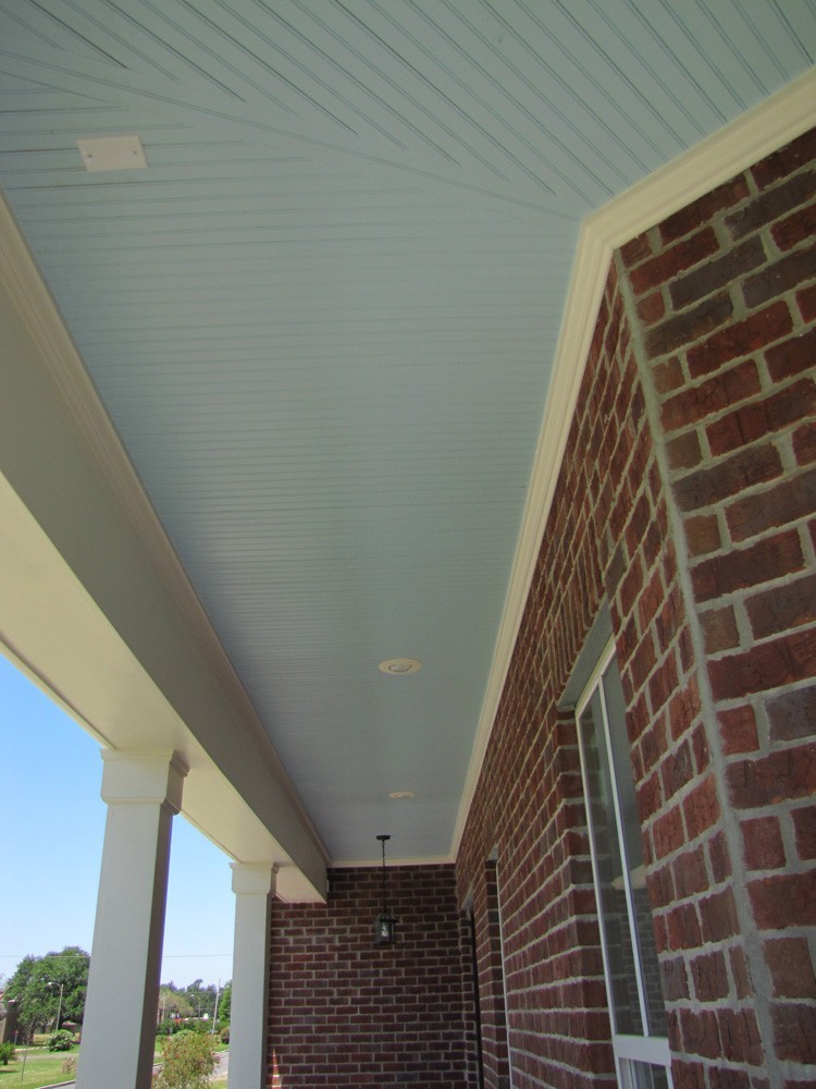 Blue bead board porch with white trim - Strong Shield