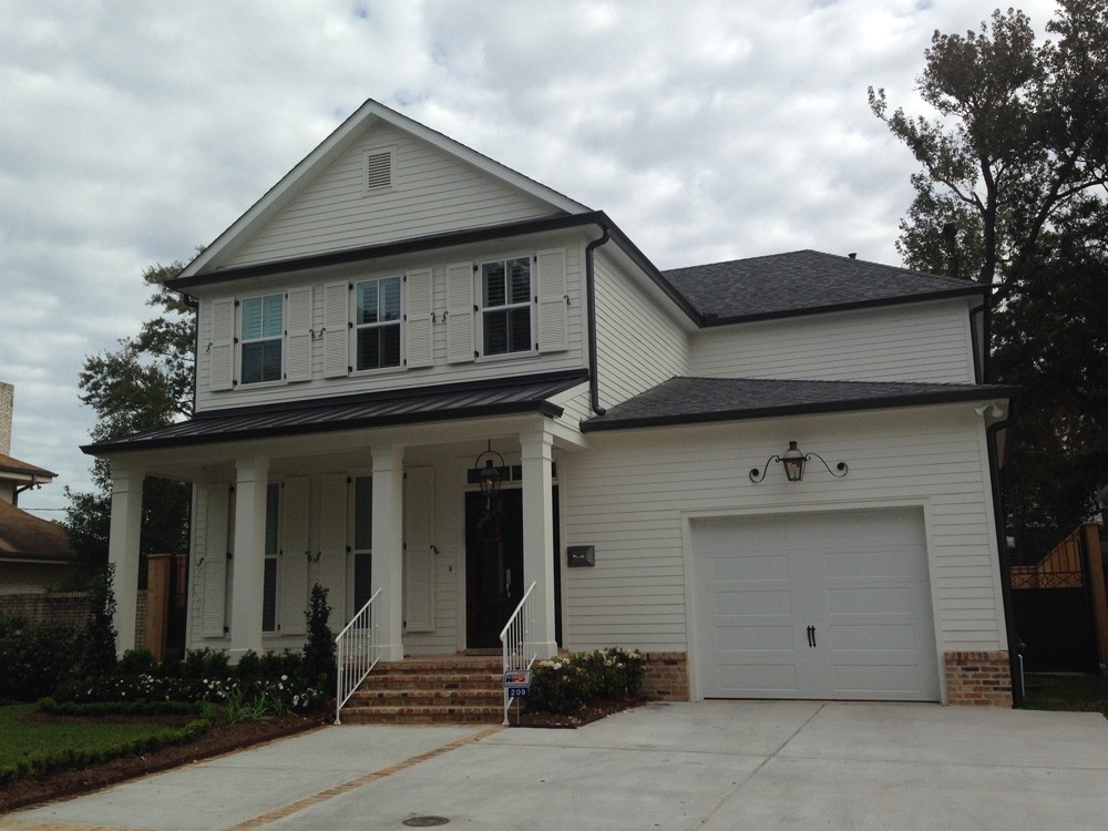 Gutters on two story home in New Orleans - Strong Shield