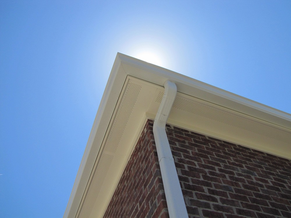 Gutters on traditional brick home in New Orleans - Strong Shield