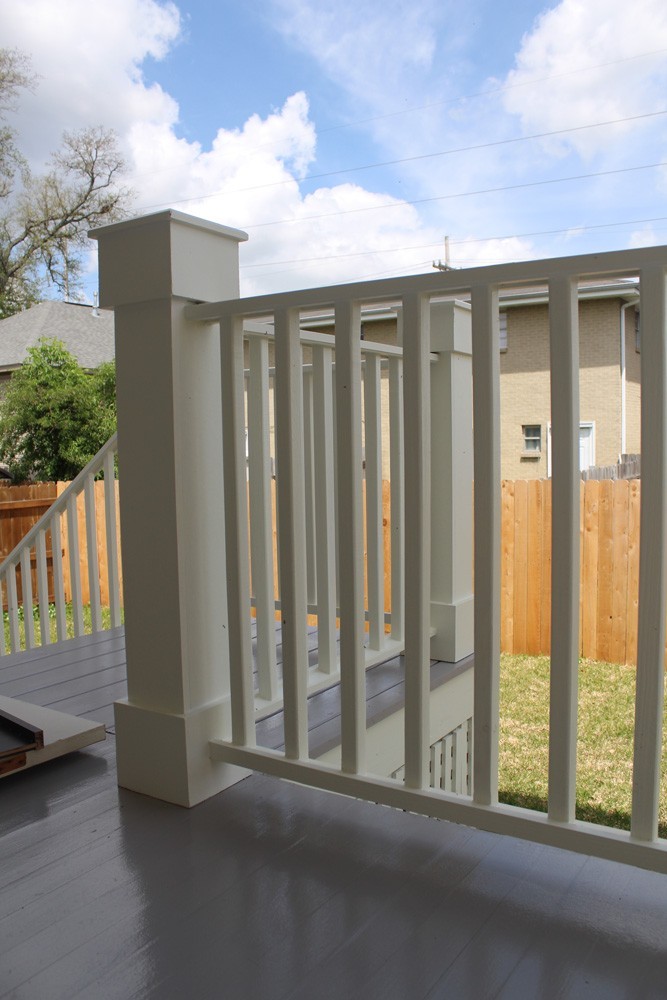 Deck and stairs with wooden rails in New Orleans - Strong Shield