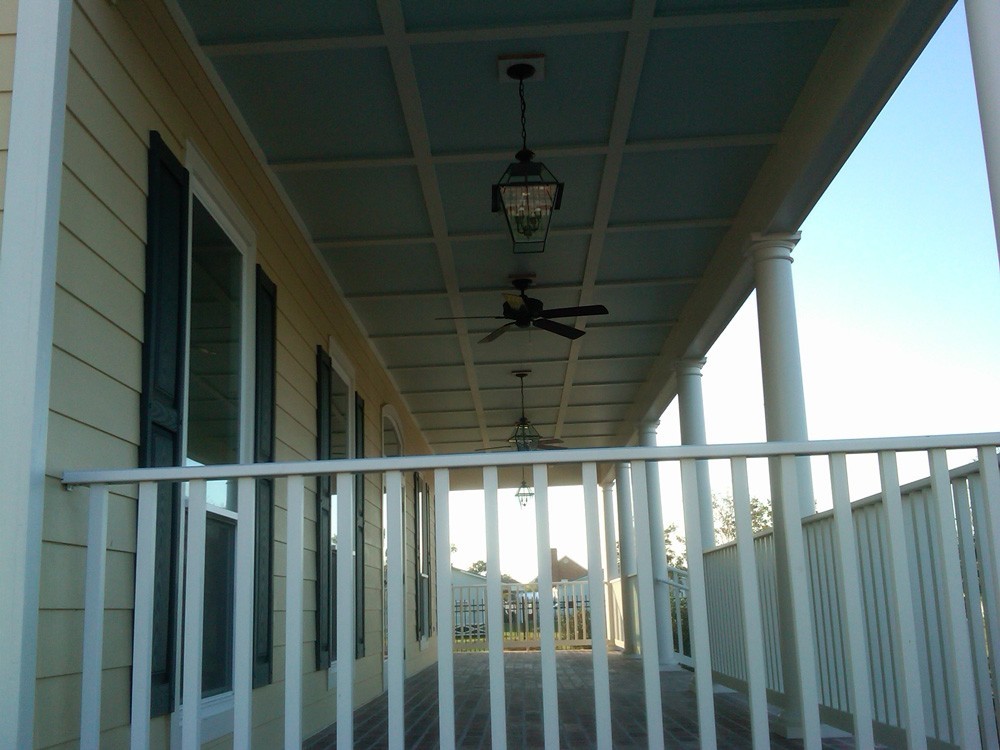 Blue porch with white trim - Strong Shield