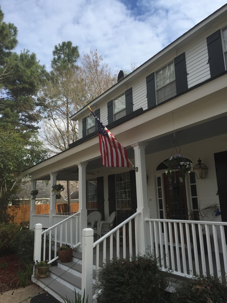 Shutters on traditional two story home - Strong Shield