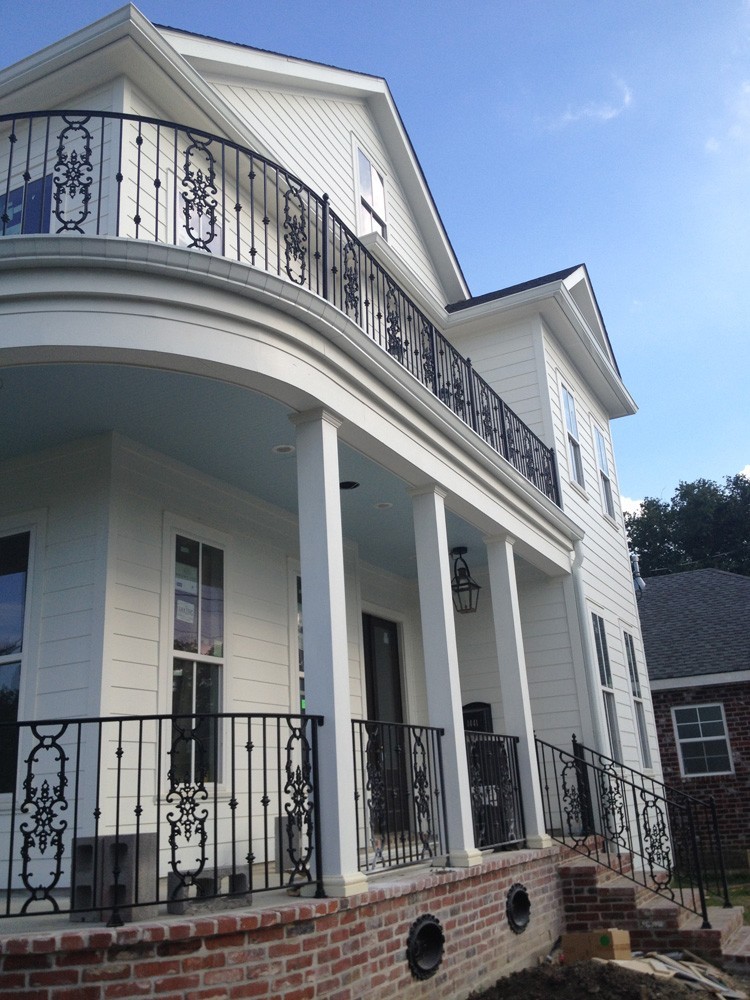 Iron railing and matching cast iron foundation vents - Strong Shield