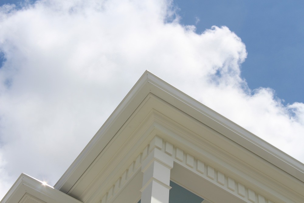 Dentil molding above craftsman style columns - Strong Shield