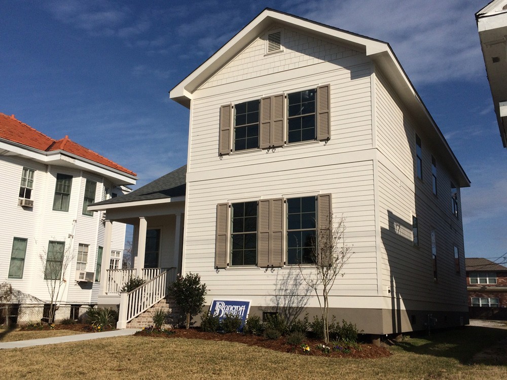 Shutters and trim between first and second floors - Strong Shield