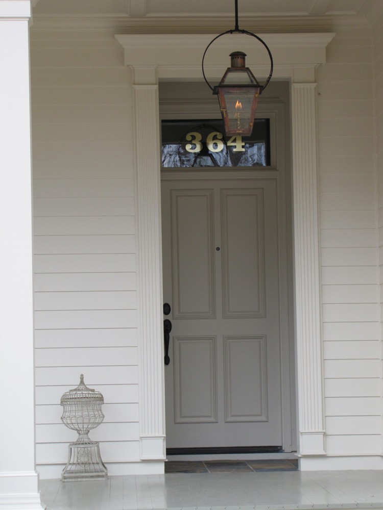 Front door trim and copper gas lantern on yoke - Strong Shield